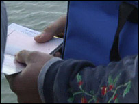 man showing passport