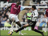 Cole and Solano tussle