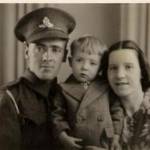The photograph shows my Grandparents, Bernard and Ellen Hogan with my father. Probably taken early 1940 in Liverpool. my grandfather is dressed in his Royal Artillery Uniform.