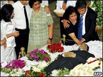 Relatives gathered at Lasantha Wickrametunga's body