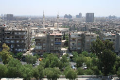 View of Damascus from a bank of Barada river.