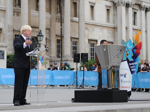 Boris Johnson speaks into microphone at Aug 24 Paralympics event (AP)