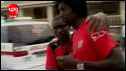 Picture from Televisao Publico de Angola channel shows the captain of the Togolese national football team Emmanuel Adebayor (R) being comforted by an unidentified teammate in Cabinda on January 8, 2010.