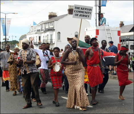 Kenyans dance at the 2004 Battle of Flowers.