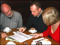 People reading in a bar
