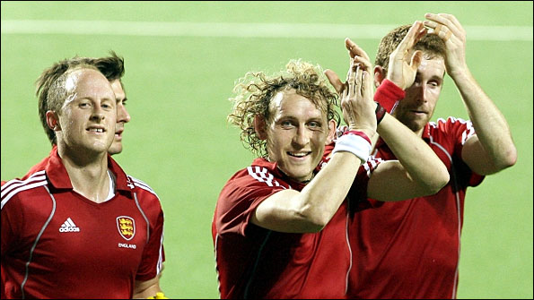England hockey team members celebrate