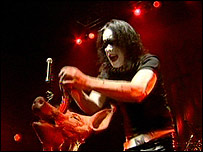 Mayhem with pig's head on stage