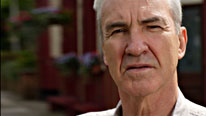 Archie (Larry Lamb) puts pressure on Roxy and Ronnie