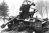 Shattered German tank, Bastogne, January 1945