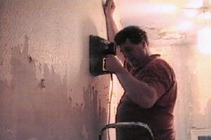 Conrad is up a ladder