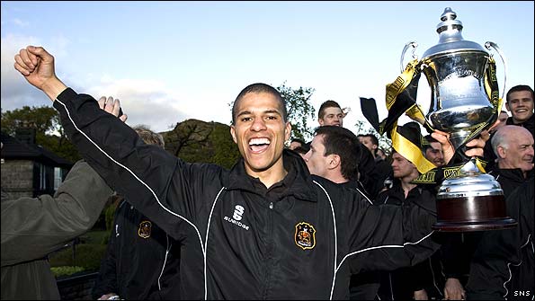 The late Gordon Lennon celebrates winning the Third Division with Dumbarton