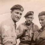 Stanley Painter's tank crew colleagues in 1944 - the caption on the back of the photo reads: "Not posed - faces etched in sand don't make good pictures"
