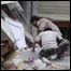 Escombros de prédio que desabou com terremoto na China