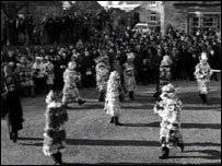 Mummers perform in village centre