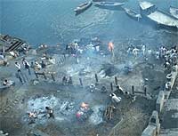Burning funeral pyres on the banks of the River Ganges