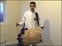 Ateeq Sharief using a Dhol Drum