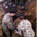 Setting up gear for the trepanning of the bomb — Close up