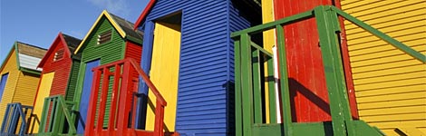 A picture of some colourful beach huts