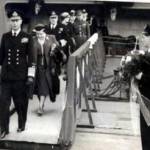 The inauguration ceremony, early 1945, of HMS Implacable aircraft carrier in Scotland at Scalpa Flow, with George VI and Queen Elizabeth (Queen Mother) coming over the gang plank