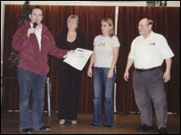 Tim Wedgewood recieving a cheque