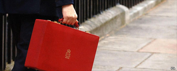 Person holding red box