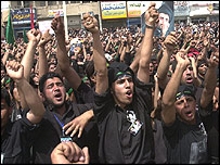 Manifestação contra as forças da coalizão liderada pelos EUA em Najaf