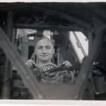 George in the cockpit of the ‘Bombay’ through the instrument panel.