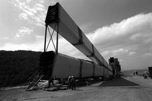 One of the masts being readied before being positioned on the viaduct.