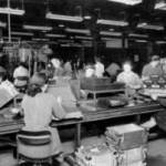Pat's mother at work in wartime factory. (standing left of centre)