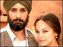 Jimi Mistry and Kristin Kreuk in Partition