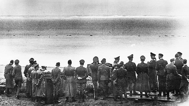 Goering, sixth from right, and other German officers look out across the English Channel towards Dover on 1 July 1940. It was as close as they would get to invading.