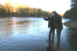 Dylan Winter and Steven Marsh-Smith wear polarising lenses to search for spawning salmon.