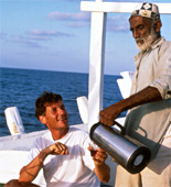 Michael Palin and Al Shama crew member Kasim, on his voyage 20 years ago