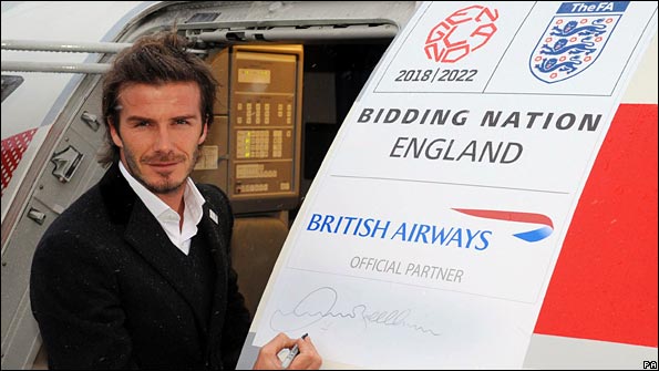 David Beckham prepares to board a plane for Zurich