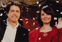 Hugh Grant and Martine Martine McCutcheon star in Love Actually. Photo: Peter Mountain. Copyright: 2003 Universal Studios