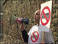 Adam Thomas protesting