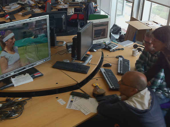 Staff watching television in an office
