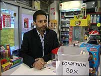 Syed with donation box