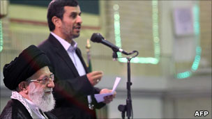 Ayatollah Khamenei listening to a speech by President Mahmoud Ahmadinejad