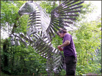 Steve Blaylock with one of his large animal sculptures