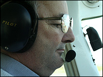 Roger Keen piloting his plane