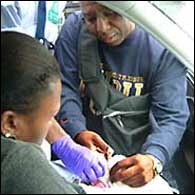 Michael cutting the umbilical cord