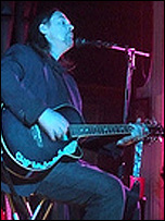 Jamie performing at the gig