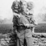 Patrick O'Doherty in Home Guard uniform with daughters Doreen and Sheilah. February 1942 outside Reymills Cottage, Lacock