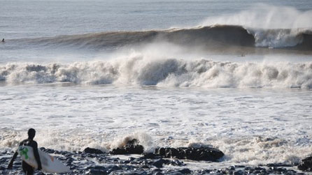 Ogmore river mouth being surfed by Martin Aaron