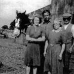 Mr & Mrs Buch, their daughter Iris and farmworkers, pictured during haytime 1947, on West Roods Farm, Boldron.