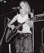 Rachel performs on stage