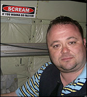 Toby Foster in a Hercules aircraft