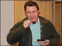 Chris Prow tries out his own braised squirrel recipe