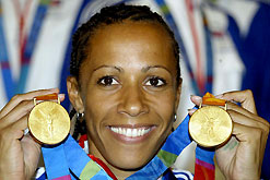 Kelly Holmes with her two gold medals from the Athens Olympics